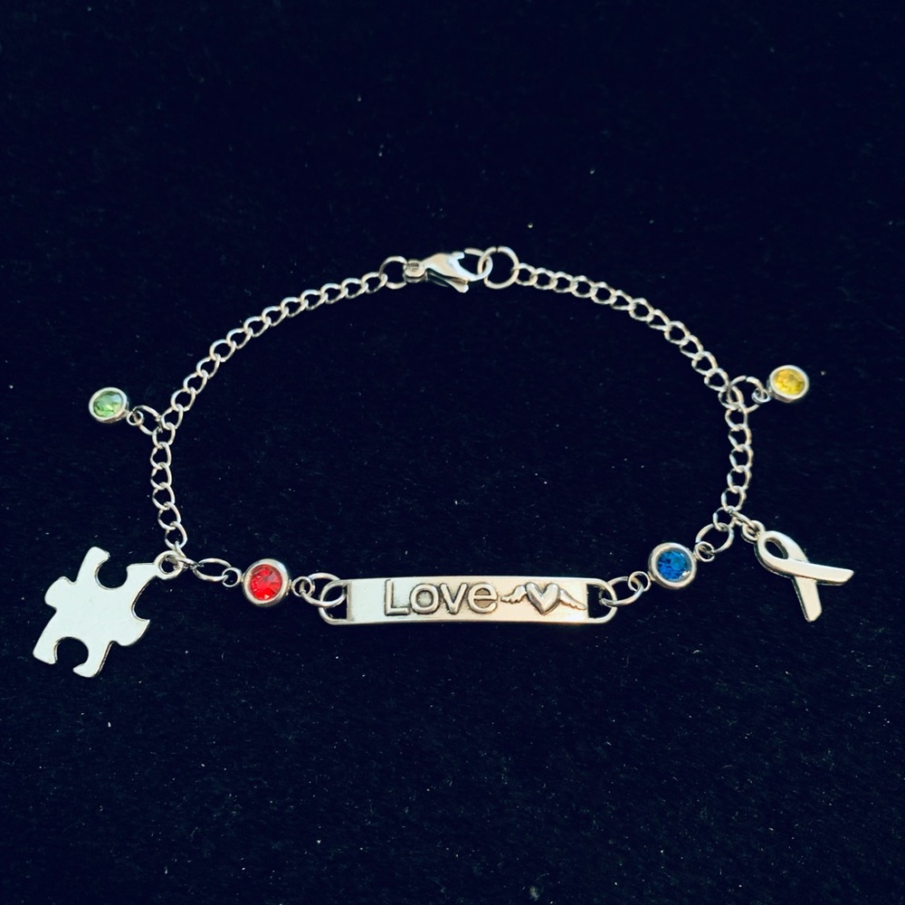 “Love” Autism Awareness bracelet with colorful rhinestone charms